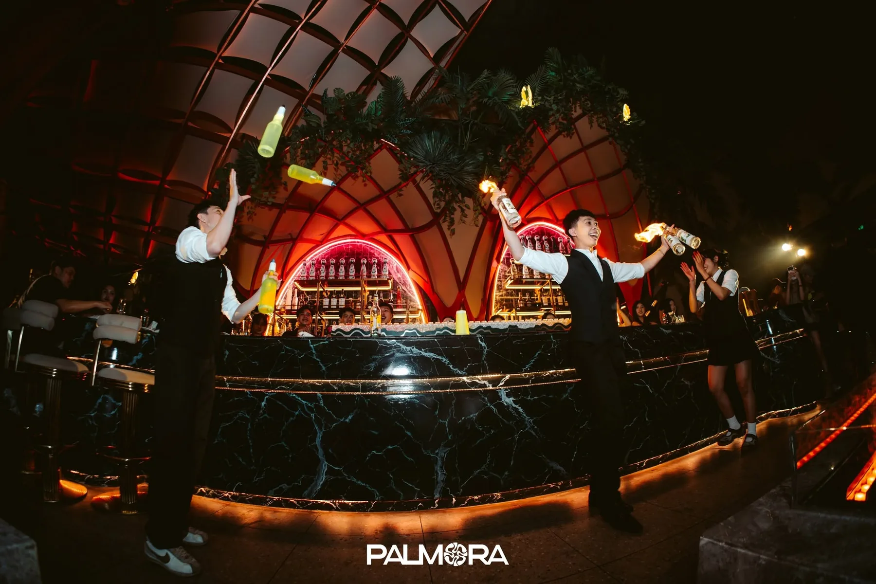 Busy evening dining atmosphere at Palmora restaurant